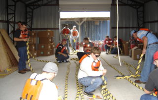 Crew members training with rope