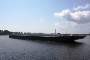 Florida Marine Transporters Chicago and Lake Class barge on water