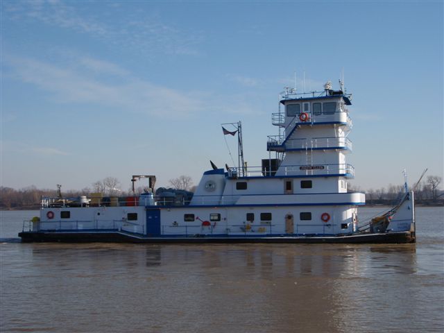 Judith Ellen towboat on water side view