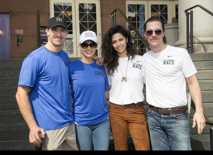Group photo with Drew Brees and Matthew McConaughey at charitable event