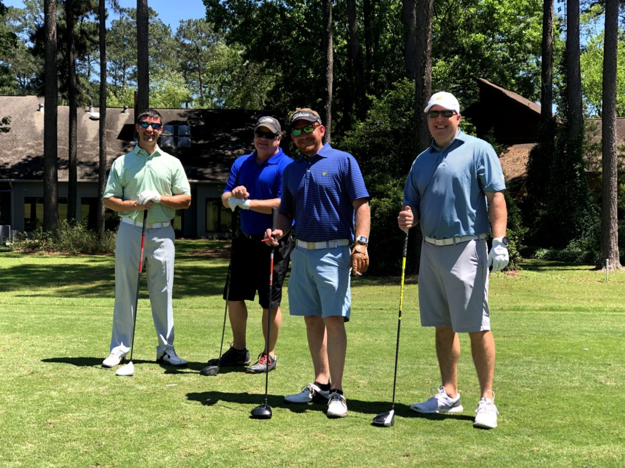 Group photo at Florida Marine Transporters Charity Golf Ball Bash Tournament