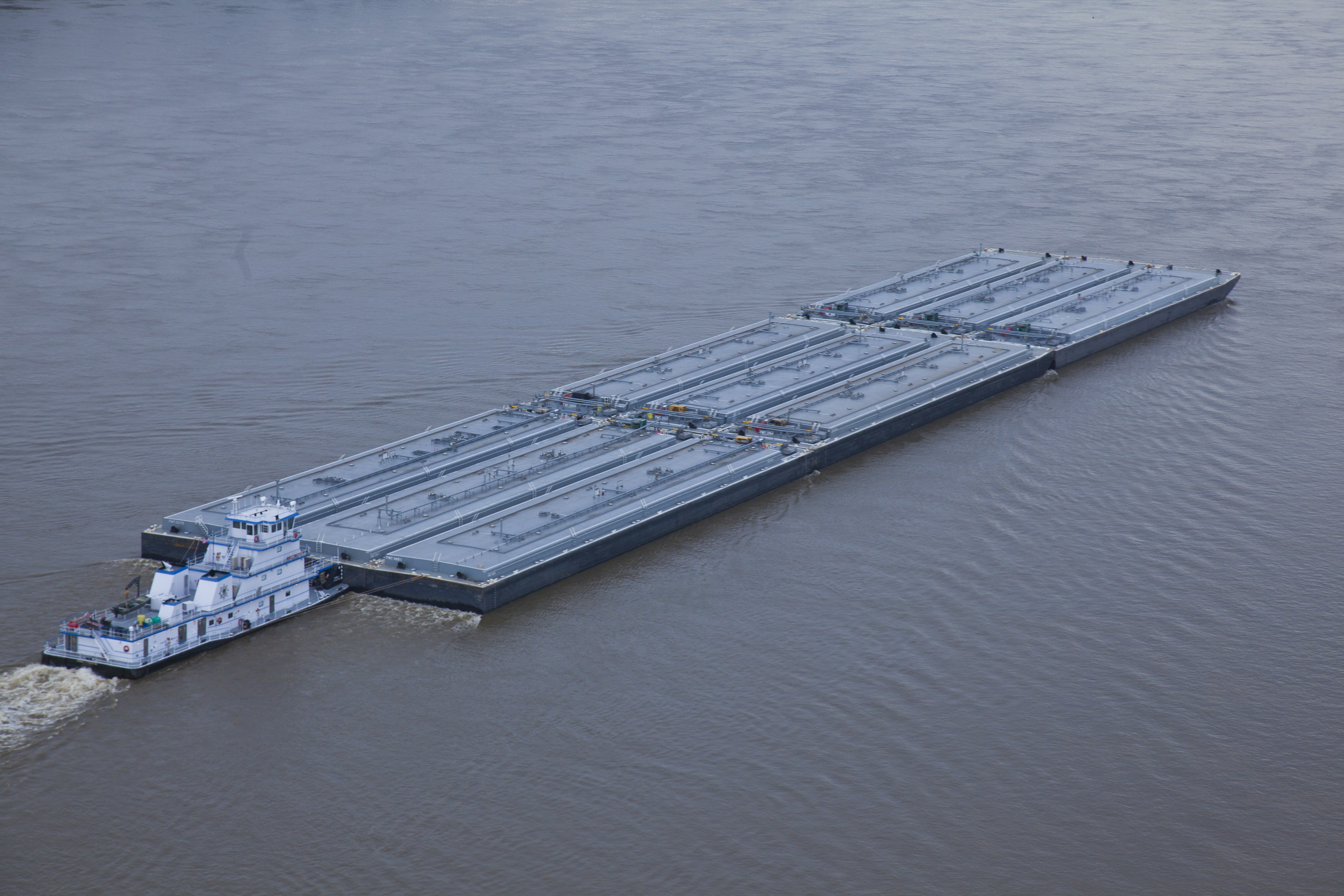 Florida Marine Transporters towboat transporting barge