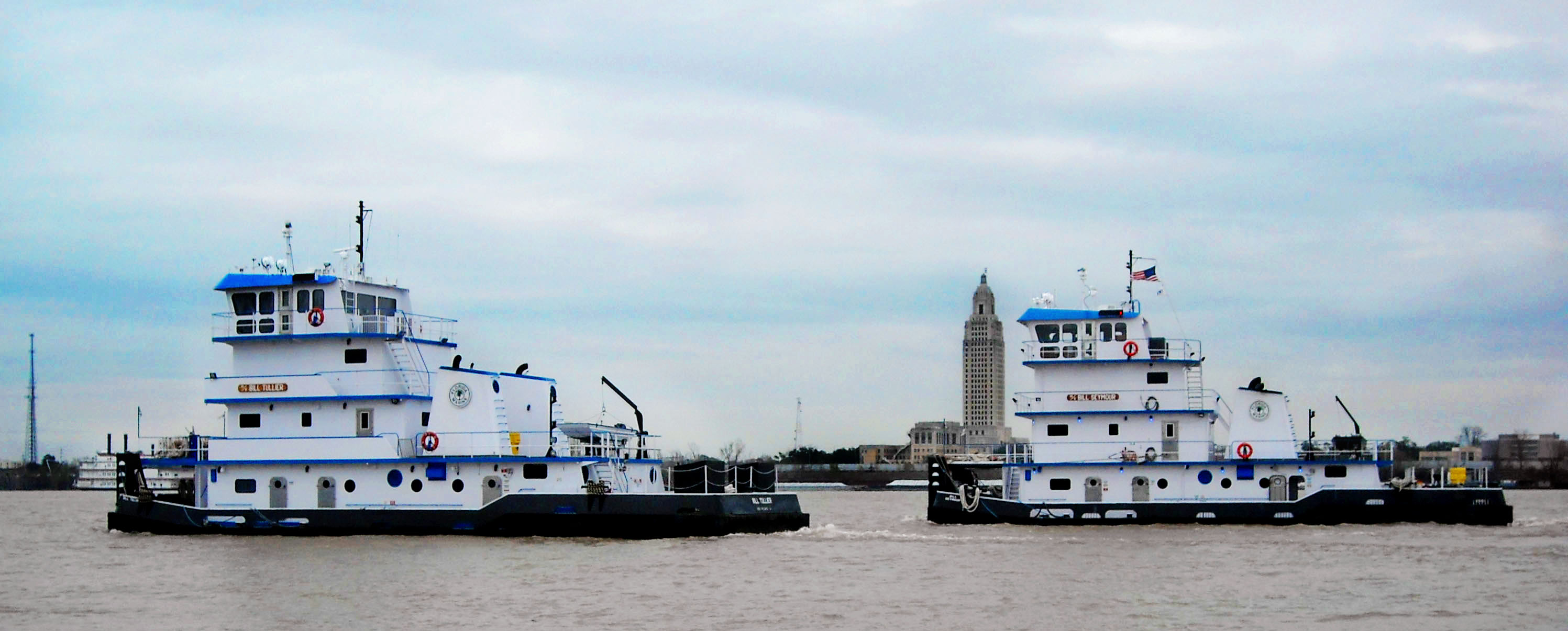 Two Florida Marine Transporters towboats on water